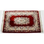 A 20th century machine woven wool work rug,