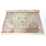 A 20th century machine woven silk work rug,