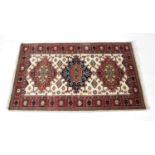 Three modern Pakistani wool rugs,