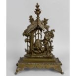 A 19th century bronze pocket watch stand,