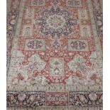 A 20th century machine woven wool work rug,