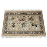 A 20th century machine woven silk work rug,