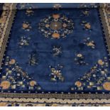 A 20th century machine woven wool work rug,