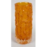 A Whitefriars orange glass 'bark' effect vase, of cylindrical form, 7.75 (19.5cm) high.