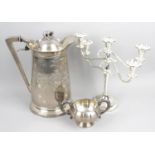 A mixed selection of assorted silver plated items to include claret jugs with cut glass bodies,