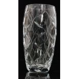 A post war Tudor Crystal glass vase of swollen sleeve form engraved and cut with a stylised leaf