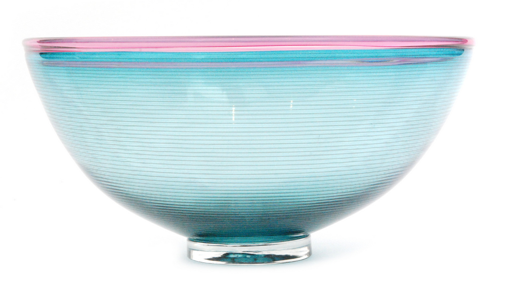 A large studio glass Venetian bowl by Bob Crooks raised on a clear crystal foot below the flared