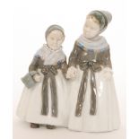 A Royal Copenhagen figure modelled as two Amager Girls modelled by Lotte Bentor, model 1316,