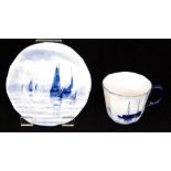 A late 19th Century Royal Crown Derby cabinet cup and saucer decorated with hand painted blue and