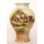 An early 20th Century Royal Worcester inverted baluster form decorated with a transfer applied and