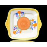 A Clarice Cliff Crocus pattern sandwich plate circa 1931 of rounded square section with integral