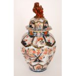 A 20th Century Chinese export hexagonal jar and cover decorated with flowers and foliage above a