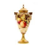 A Royal Worcester Fallen Fruits pedestal vase and cover decorated in the round by Leaman with hand