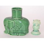 A 1930s Art Deco Spode Royal Jade model of a stylised owl, glazed in green,