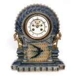 Robert Wallace Martin - Martin Brothers - A late 19th Century mantel clock,