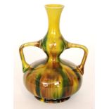 Burmantofts - An early 20th Century shape 194 double gourd twin handled vase decorated in a