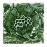 William de Morgan - Merton Abbey - An 8in plastic clay tile decorated in the green BBB pattern,