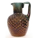 Thomas Webb & Sons - A late 19th Century Bronze Ware glass jug of sleeve form below a slender shaft