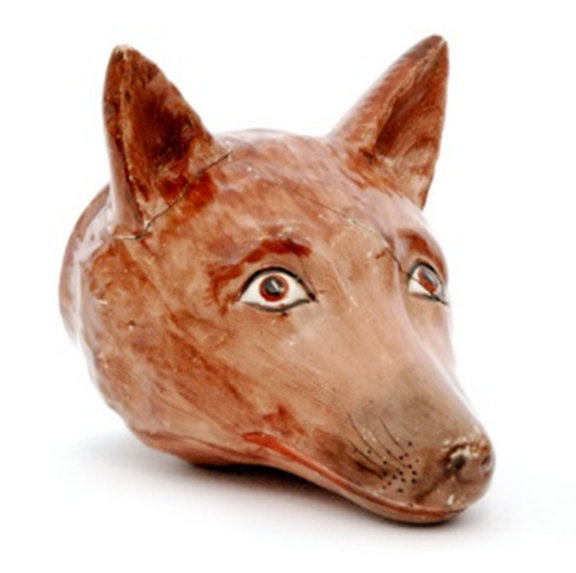 A 19th Century Staffordshire creamware stirrup cup formed as a fox head with painted decoration,
