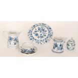 Six pieces of assorted early 20th Century blue and white Onion pattern comprising a Meissen teacup,