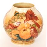 A Moorcroft Pottery vase of ovoid form decorated in the Finches pattern designed by Sally Tuffin,