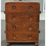 A 19th Century mahogany and brass bound four drawer military chest, with recessed turned handles,