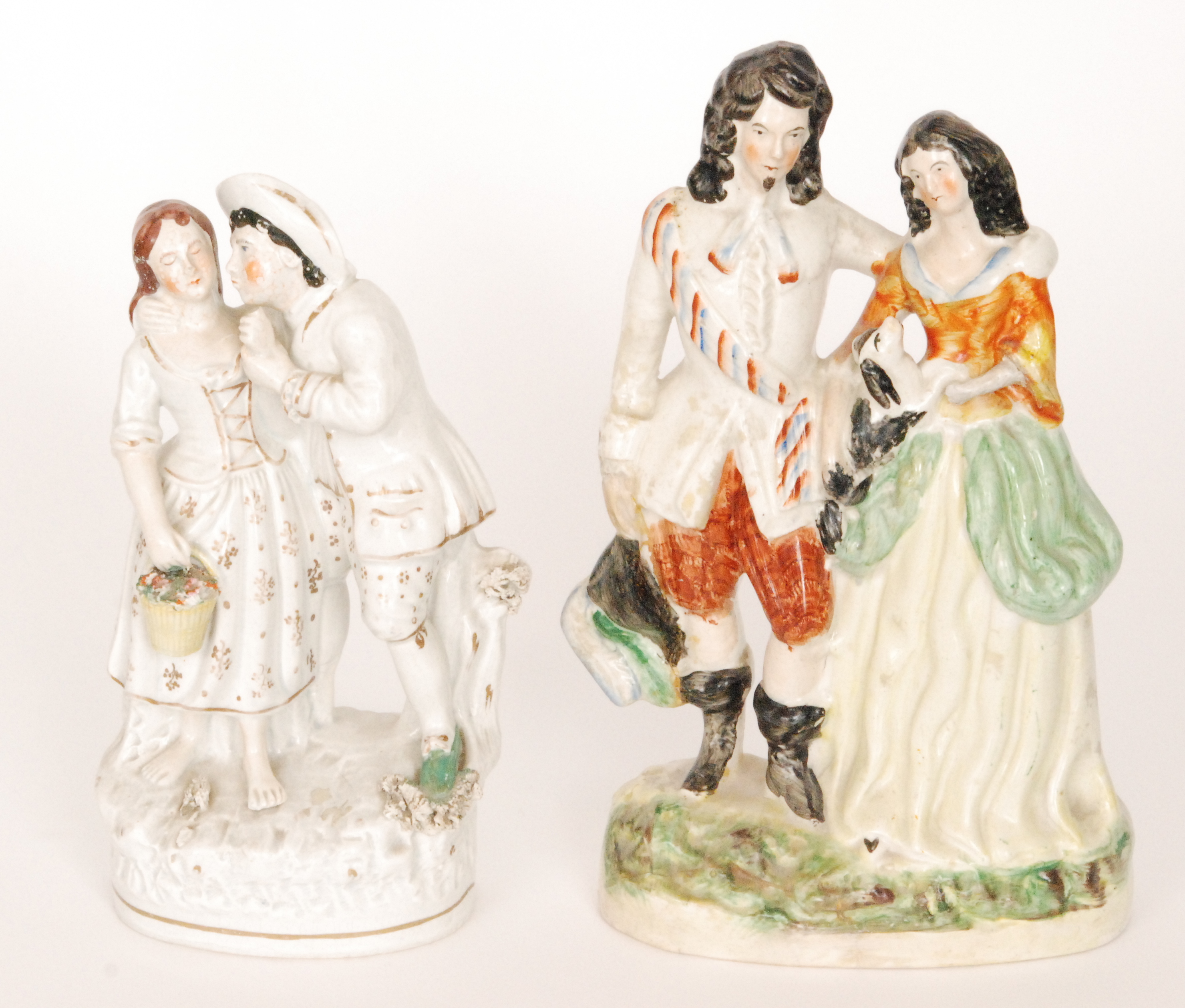 Two 19th Century Staffordshire flat back figures,