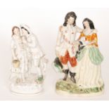 Two 19th Century Staffordshire flat back figures,