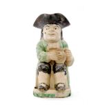 A late 18th Century Ralph Wood type Ordinary Toby jug,