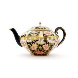 An early 20th Century Royal Crown Derby Imari pattern 6629 miniature teapot,