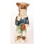 A 19th Century Staffordshire Thin Man Toby jug,