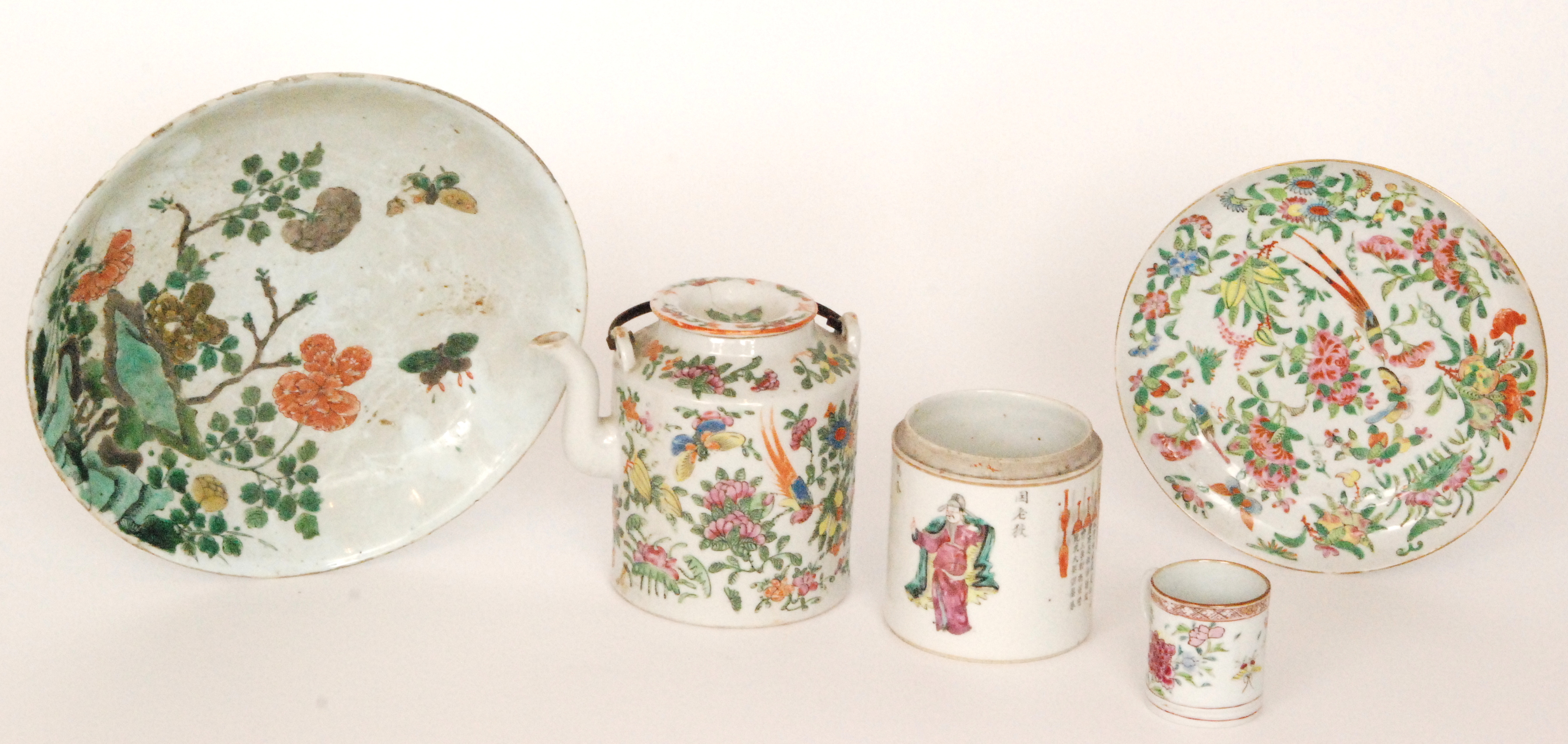 Five pieces of assorted late 19th Century Chinese Famille Rose comprising a shallow charger,