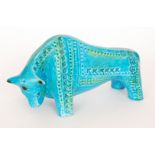 A post war Jema of Holland model of a bull glazed in blue and green with impressed patterned