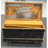 A pine carpenters tool chest and assorted tools.