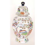 A large early 20th Century Masons Ironstone hexagonal vase and cover decorated with birds amidst
