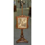 A Victorian mahogany tapestry panelled pole screen,