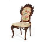 A Victorian rosewood side chair, with an acanthus scroll frame and cabriole front legs,