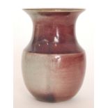 A later 20th Century studio pottery vase by George Wilson of shouldered ovoid form with a flared