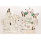 Two 19th Century Staffordshire flat back figures, the first modelled as a gentleman on his horse,
