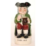 A 1930s advertising / promotional Ordinary Toby jug detailed to the pedestal Charrington's Toby Ale,