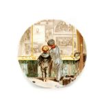 An early 20th Century wall plaque hand painted with a scene of two young boys peering through a