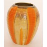 A 1930s Shelley Harmony vase of swollen form glazed in orange and mustard with brown streaking,