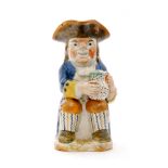 A late 18th Century Ralph Wood type Ordinary Toby jug,