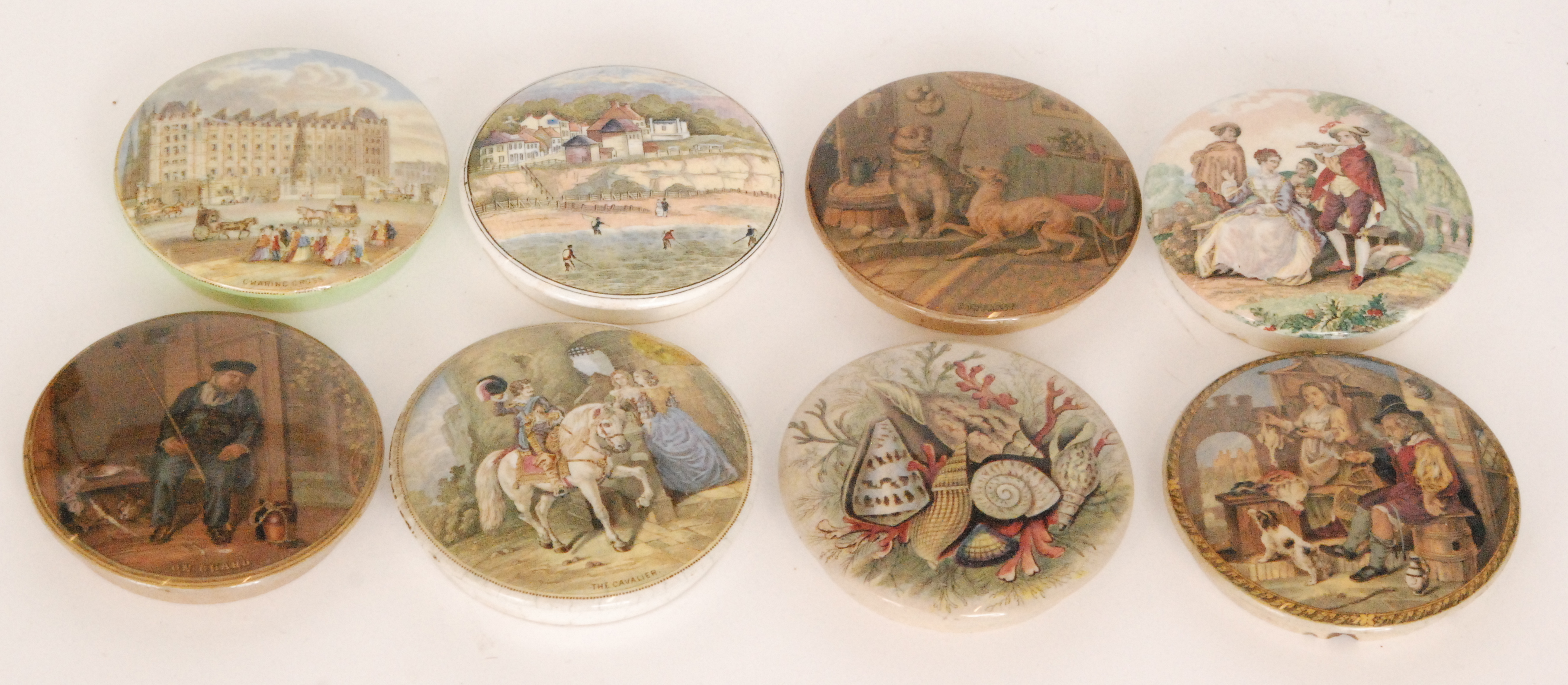 Eight assorted 19th Century Staffordshire Pratt Ware pot lids comprising On Guard, Contrast,