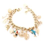 A 9ct hallmarked filled curb charm bracelet with twelve 9ct and yellow metal charms attached,