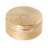 A George V hallmarked 9ct circular pill box by Asprey and Co,