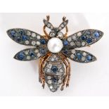 A silver gilt brooch modelled as a bee set with sapphires,