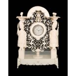 A 19th Century carved bone watch stand, possibly a prisoner of war example,