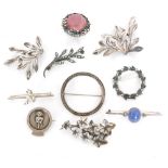 Ten assorted silver brooches to include marcasite, stone set and other examples,