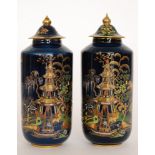 A pair of 1930s Art Deco Carlton Ware cylindrical vase and covers decorated in the Chinese Tea